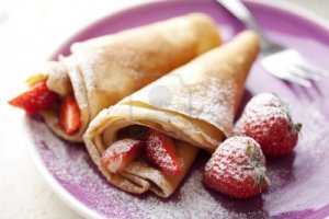 10531274-french-style-crepes-with-fresh-strawberries-and-caster-sugar